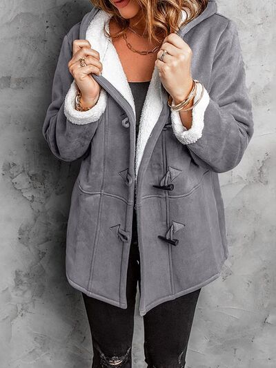 Full Size Pocketed Long Sleeve Hooded Toggle Jacket – Stylish & Functional Outerwear for Women by Stevvex